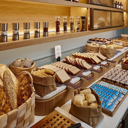 Palacio De Aviles Affiliated By Melia Екстериор снимка Bread and pastry at a buffet