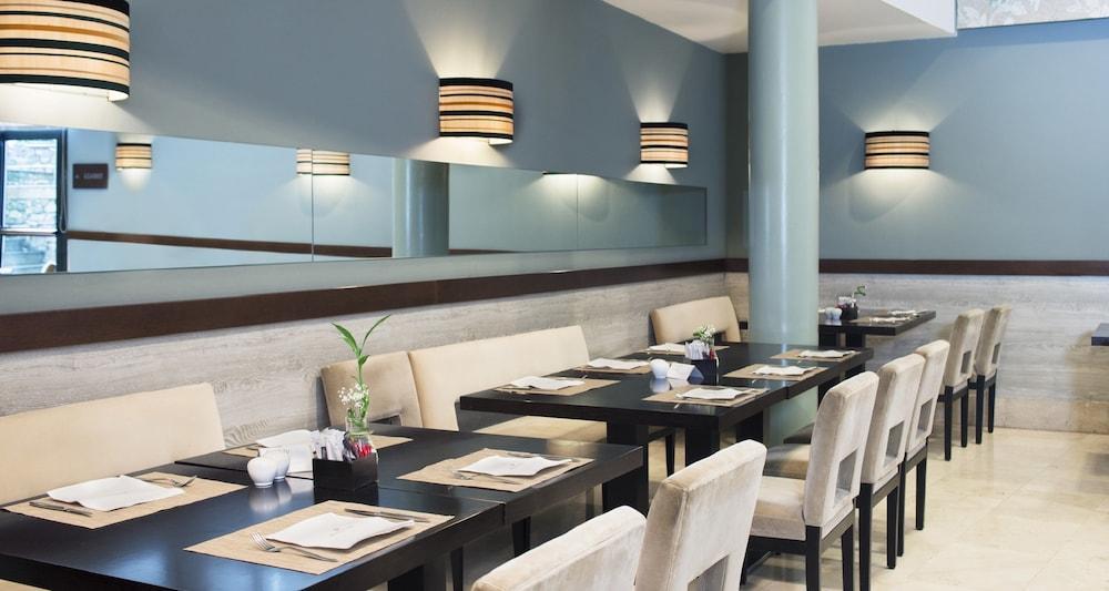 Palacio De Aviles Affiliated By Melia Екстериор снимка Restaurant interior