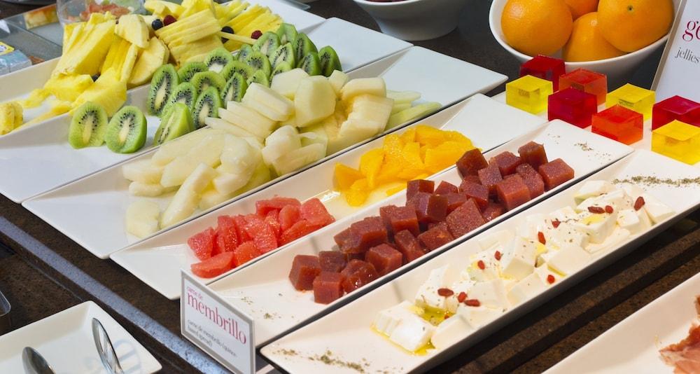 Palacio De Aviles Affiliated By Melia Екстериор снимка Fruit and cheese at a buffet