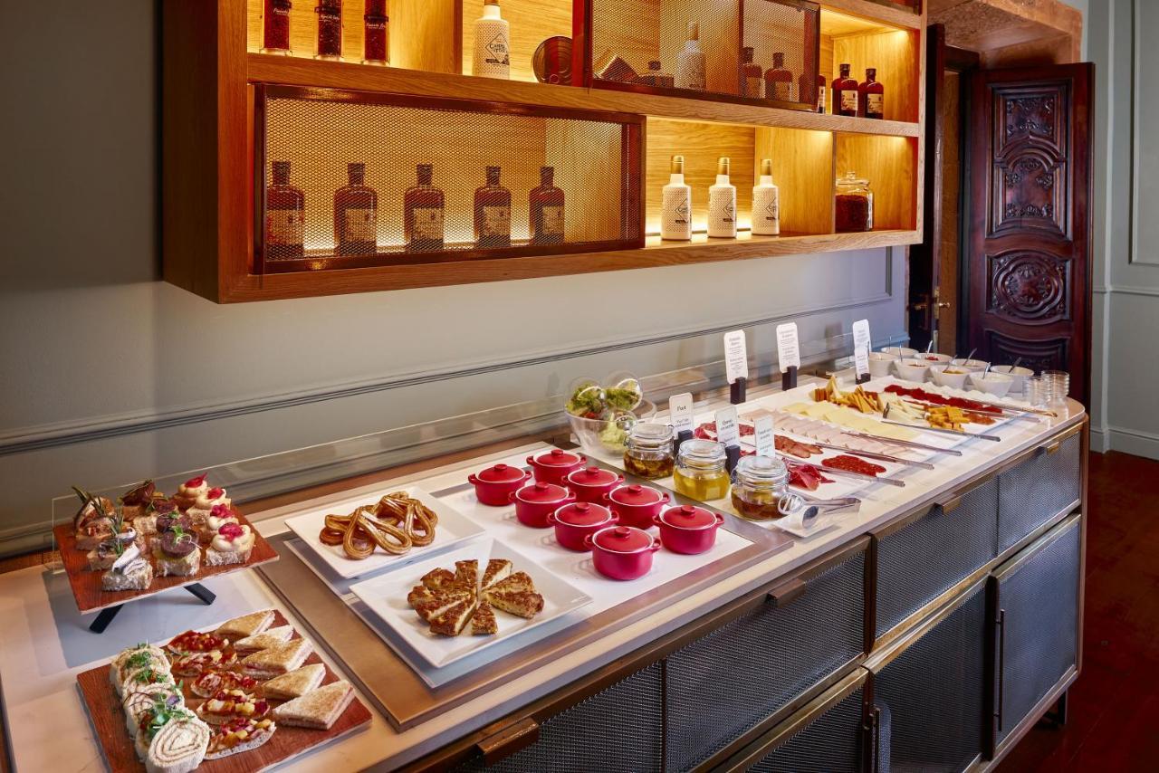 Palacio De Aviles Affiliated By Melia Екстериор снимка A buffet at a hotel