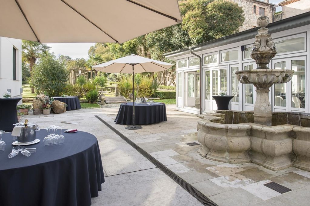 Palacio De Aviles Affiliated By Melia Екстериор снимка The hotel's garden